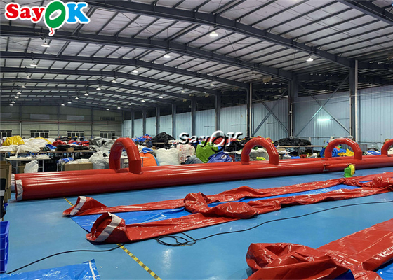 Outdoors Water Inflatable Slides PVC Tarpaulin Inflatable Water Slide Tiled On Flat Ground 60x2m